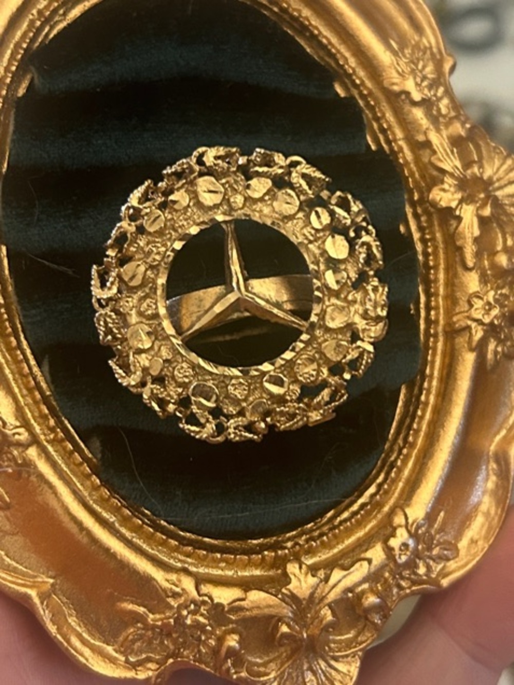 Vintage Mercedez-benz logo ring with textured gold design